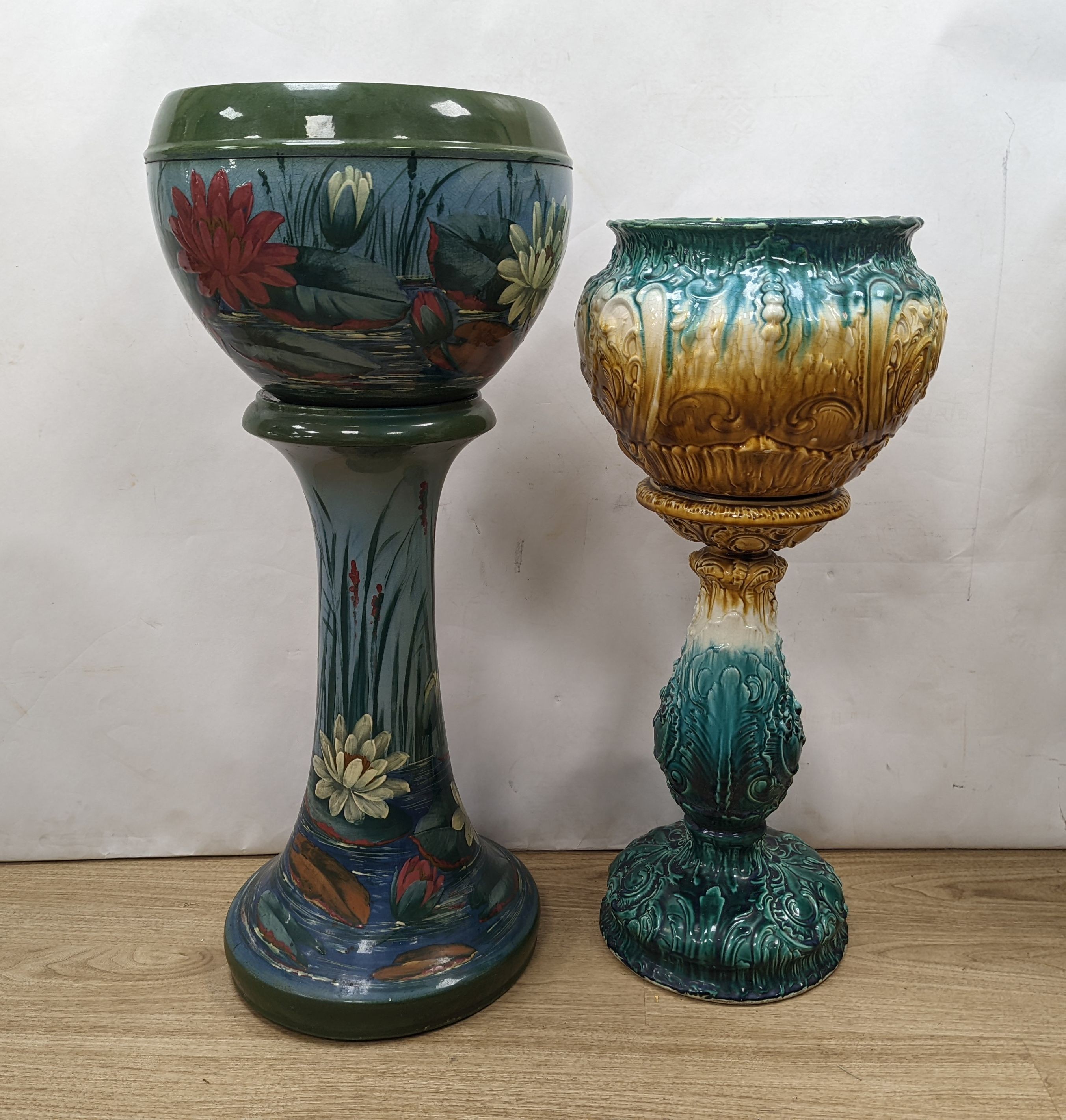 A Staffordshire pottery jardiniere and stand (the jardiniere with a small crack) and another, tallest 90cm